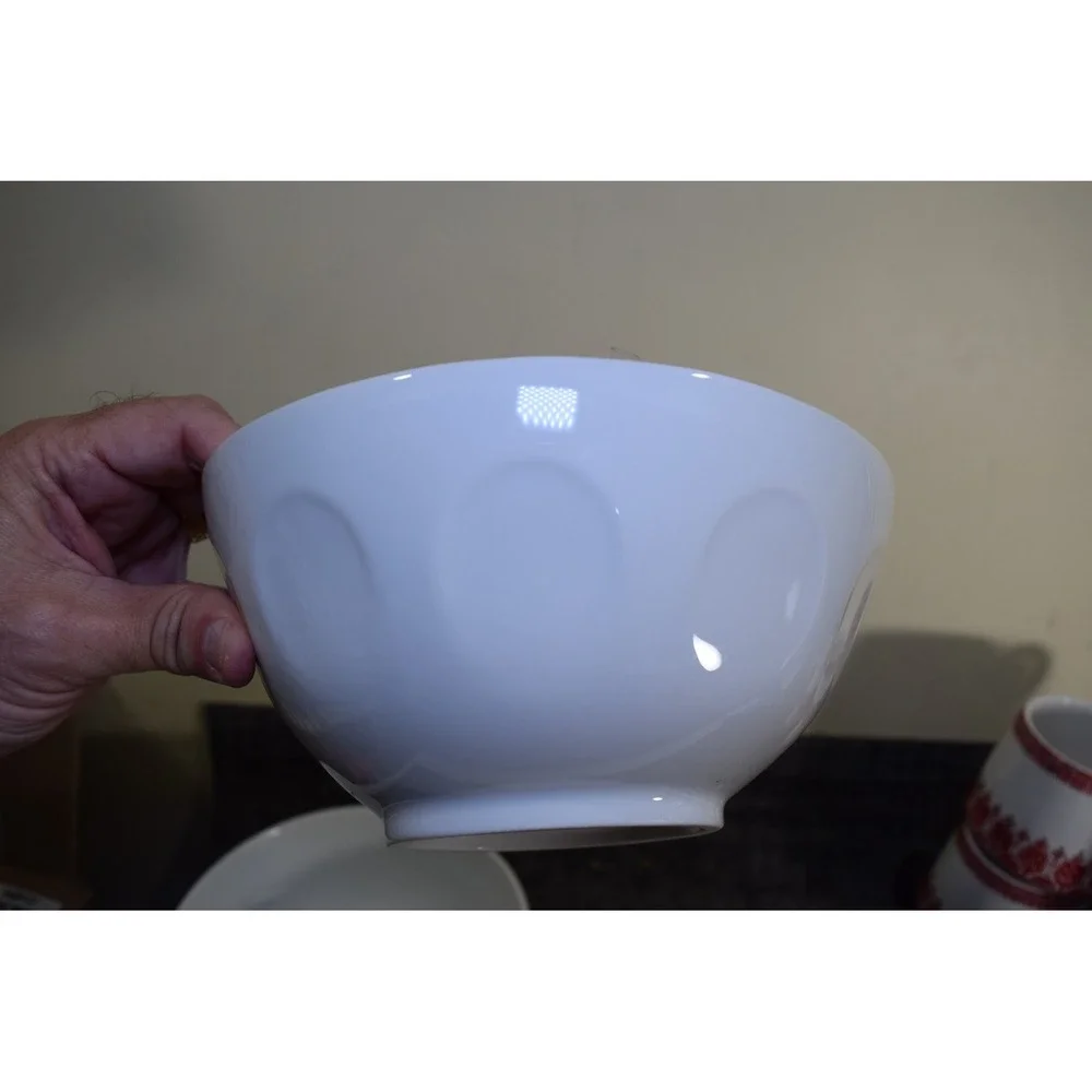 Tassen 58 Products serving faces